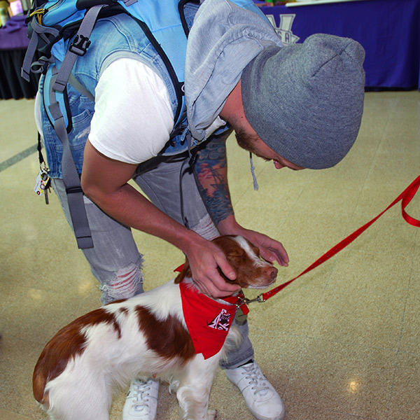 student with dog