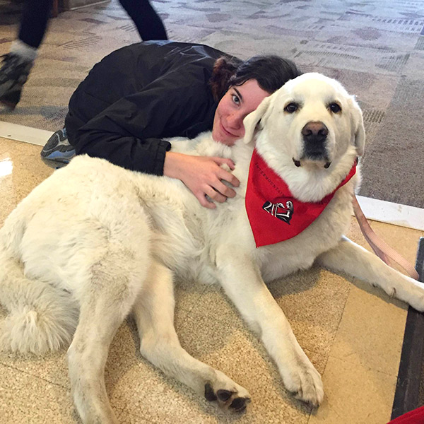 student with dog