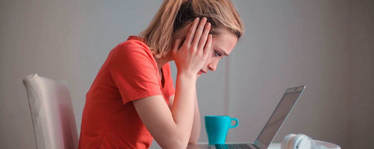 student in front of computer