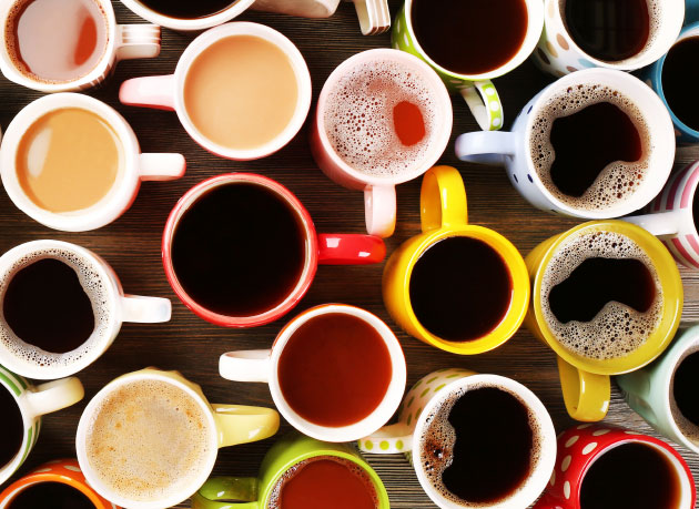 photo of different types of coffee drinks in different color cups
