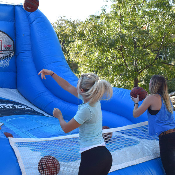 students playing basketball