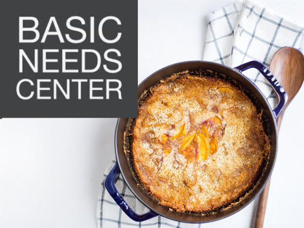 Basic Needs Center logo with dutch oven cobbler