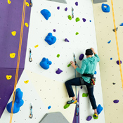 Matthew Barry climbing artificial rock wall