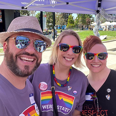 A group of people at an outdoor pride event