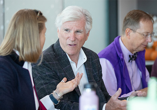 Delegate of Uzbekistan's Ministry of Education discussing educational policy with Weber State Staff & Faculty.