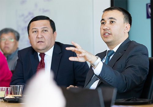 Delegate of Uzbekistan's Ministry of Education discussing educational policy with Weber State Staff & Faculty.