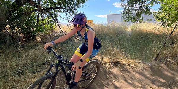 youth on mountain bike