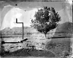 Photo of basketball hoop and cement slab on a Navajo reservation.