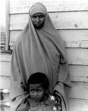 Photo of a refugee woman and child.