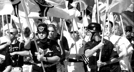 Aryan storm troopers leading dozens of Ku Klux Klan members in full regalia down the streets of Coeur d'Alene, Idaho.